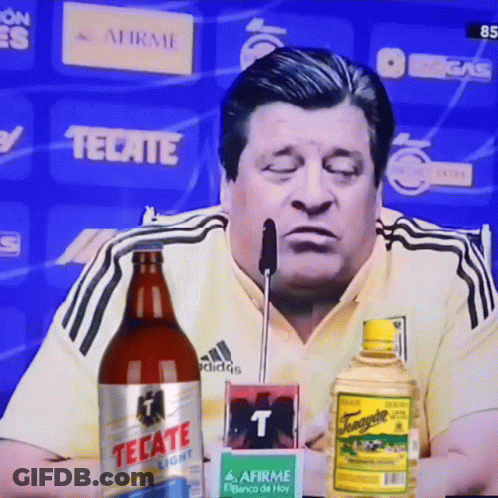Man Sitting With Tecate Light GIF