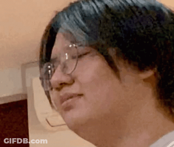 Man Slapping Face By A Fish GIF