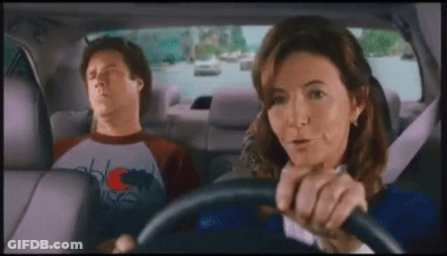 Man Sleeping In Back Seat While Woman Drives GIF