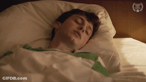 Man Sleeping In Bed With Atlanta Film Festival Laurel GIF