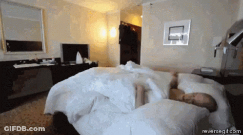 Man Sleeping In Hotel Room With Reversegif.com GIF