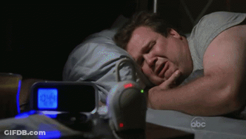 Man Sleeping Next To Alarm Clock GIF