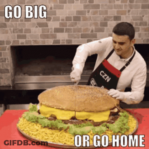 Man Slicing Huge Burger GIF