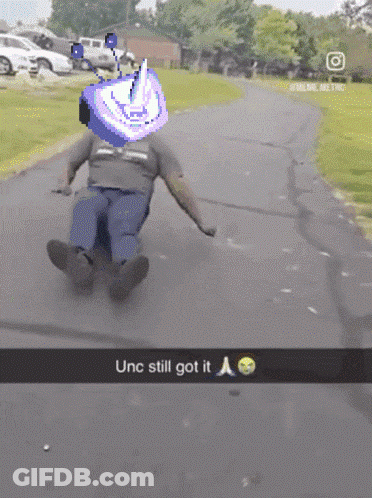 Man Sliding Down Road Saying UNC Still Got It GIF