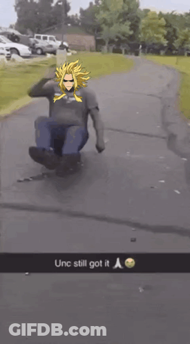 Man Sliding Down Sidewalk In Cartoon Shirt GIF