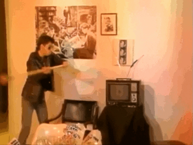 Man Smash The Tv GIF