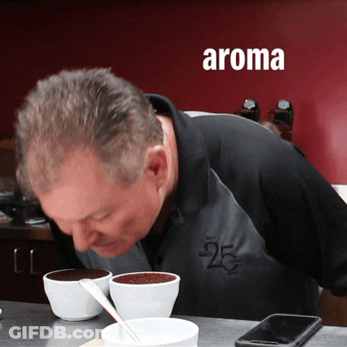 Man Smelling Espresso Aroma GIF