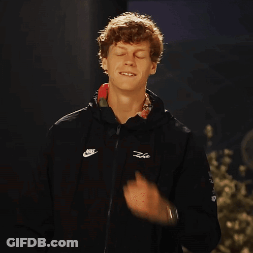 Man Smiling Adjusting Black Nike Jacket GIF