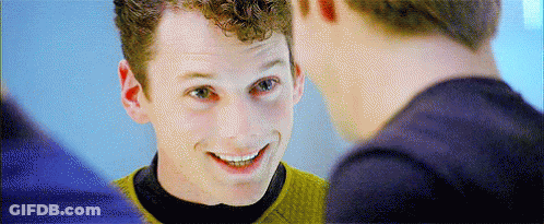 Man Smiling At Himself In Mirror GIF