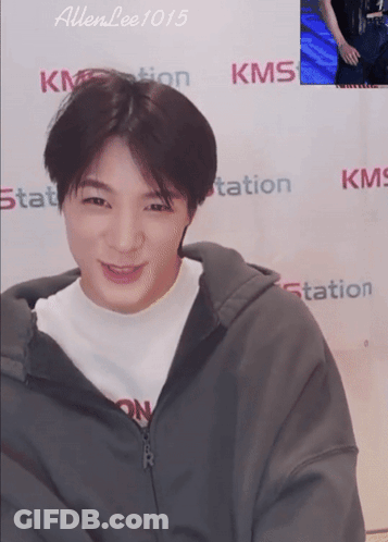 Man Smiling At KMS Station Wall GIF