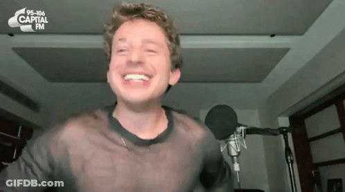 Man Smiling At Microphone 95-106 Capital FM GIF