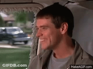 Man Smiling Back Seat Of Car Looking Out Window GIF