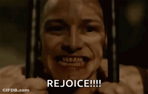 Man Smiling Behind Bars In Prison Cell GIF