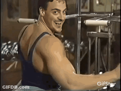 Man Smiling During Workout GIF