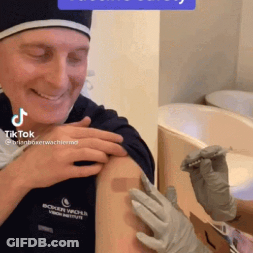 Man Smiling Getting Vaccine At Boxer Wache Vision Institute GIF