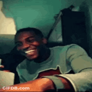 Man Smiling Holding Guitar GIF
