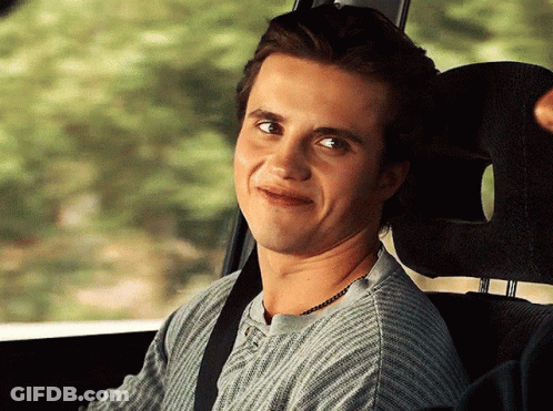 Man Smiling In Back Seat GIF