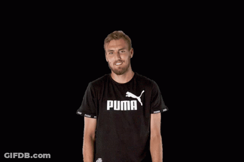 Man Smiling In Black Puma T-Shirt GIF