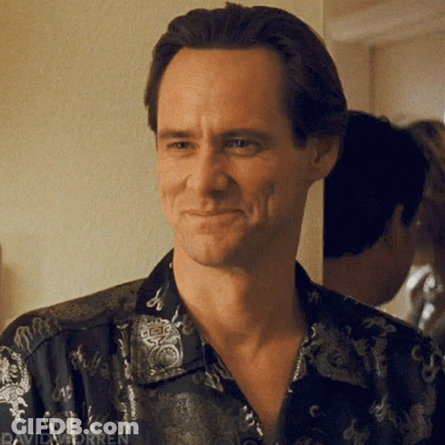 Man Smiling In Black Shirt With Dragons GIF