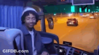 Man Smiling In Bus Driver's Seat GIF