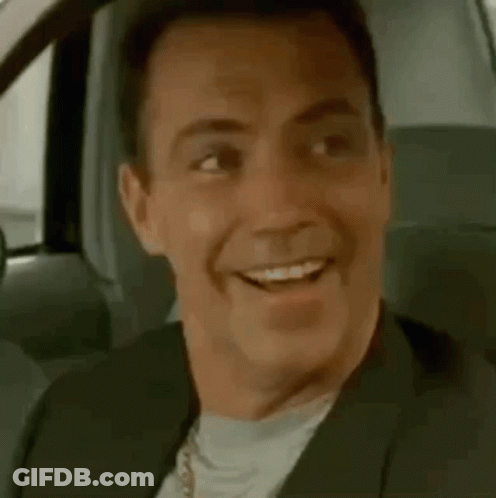 Man Smiling In Car GIF