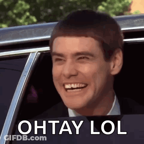 Man Smiling In Car With Ohtay Lol GIF