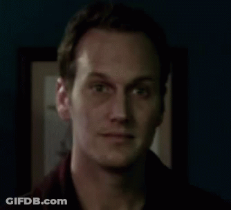Man Smiling In Dark Room GIF