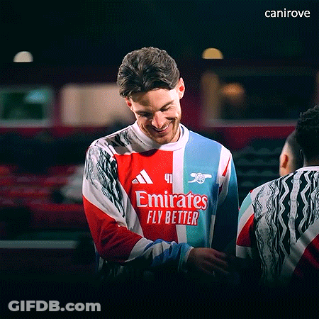 Man Smiling In Emirates Fly Better Jersey GIF