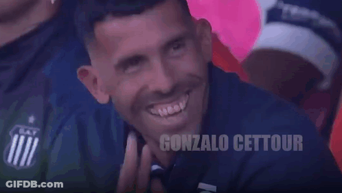 Man Smiling In Front Of Punto Inteligente Sign GIF