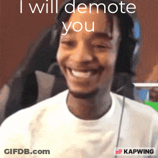 Man Smiling In Front Of Screen Saying I Will Demote You GIF