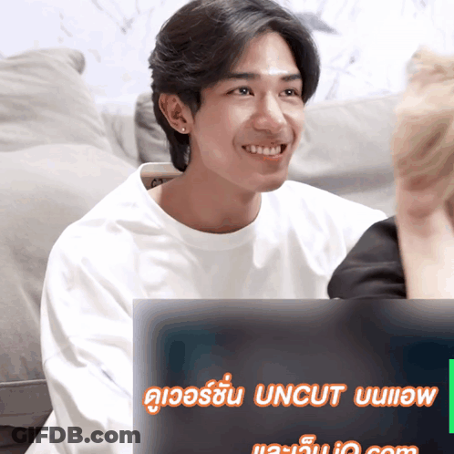 Man Smiling In Front Of Uncut Screen GIF