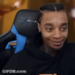 Man Smiling In Gaming Chair GIF