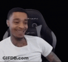 Man Smiling In Gaming Chair GIF