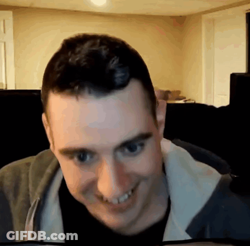 Man Smiling In Grey Jacket GIF