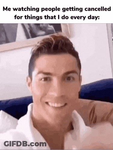 Man Smiling On Couch Looking At Camera GIF