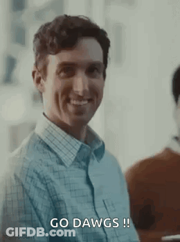 Man Smiling Saying Go Dawgs GIF