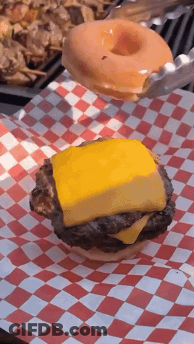 Man Smiling Saying Great Minds GIF
