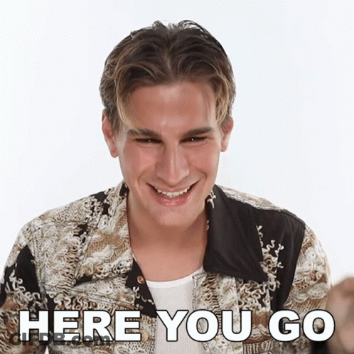 Man Smiling Saying Here You Go GIF