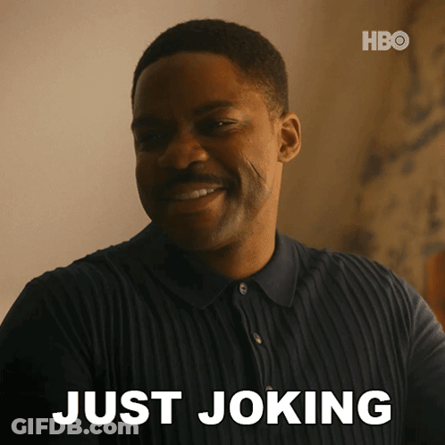 Man Smiling Saying Just Joking GIF