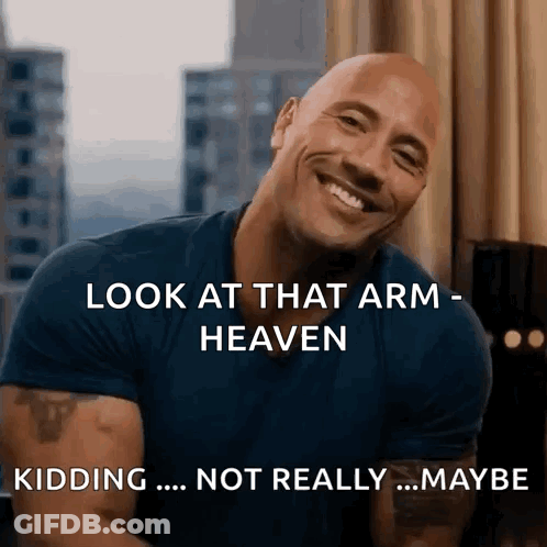 Man Smiling Saying Look At That Arm GIF