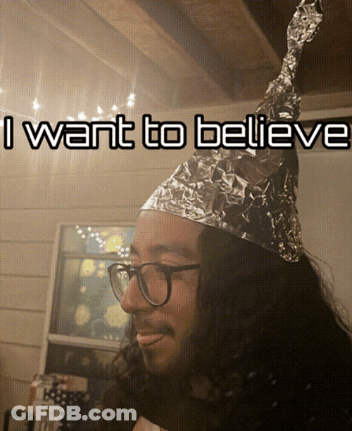 Man Smiling Wearing Tin Hat GIF