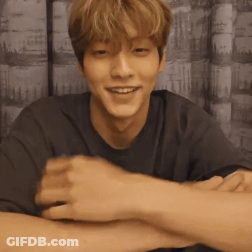 Man Smiling With Crossed Arms GIF