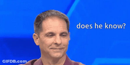 Man Smiling With Does He Know Text GIF
