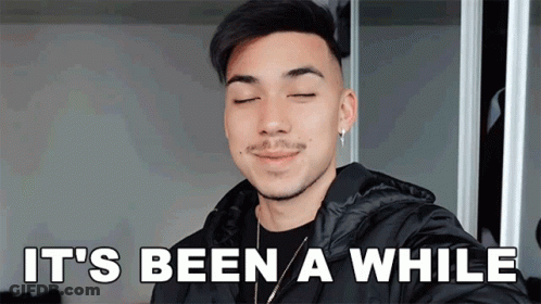 Man Smiling With Eyes Closed Says Been A While GIF
