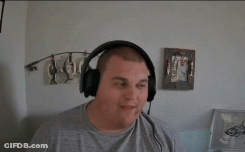 Man Smiling With Headphones And Well Well GIF