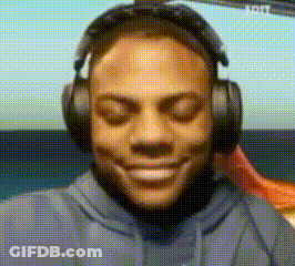 Man Smiling With Headphones GIF