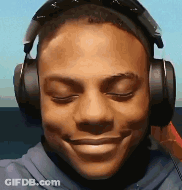 Man Smiling With Headphones GIF