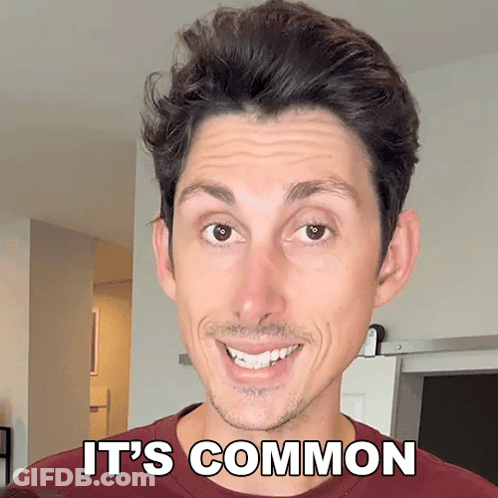 Man Smiling With It's Common Above His Face GIF
