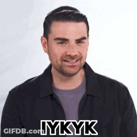 Man Smiling With IYKYK GIF