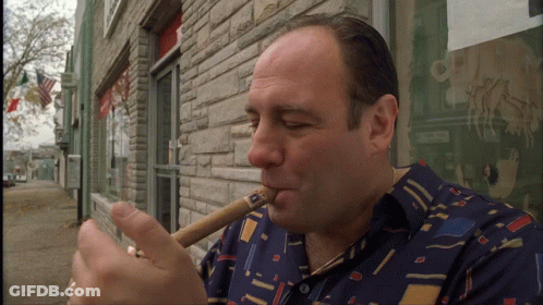 Man Smoking Cigar GIF